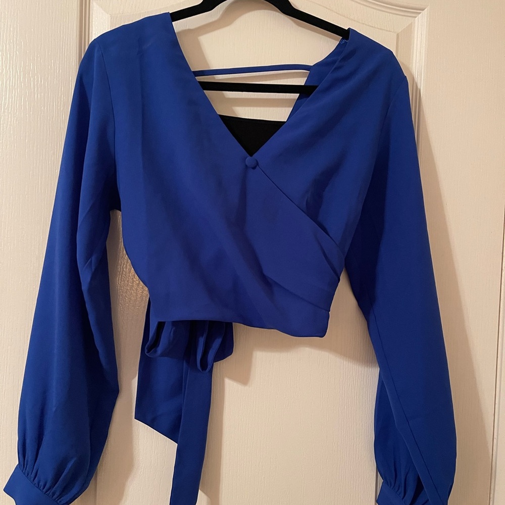 Elegant Blue Wrap Top by Bebe
